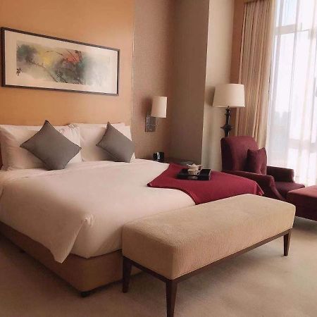 Somerset Grand Central Dalian Bagian luar foto