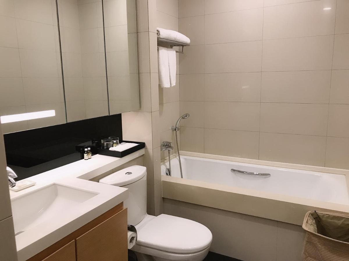 Somerset Grand Central Dalian Bagian luar foto