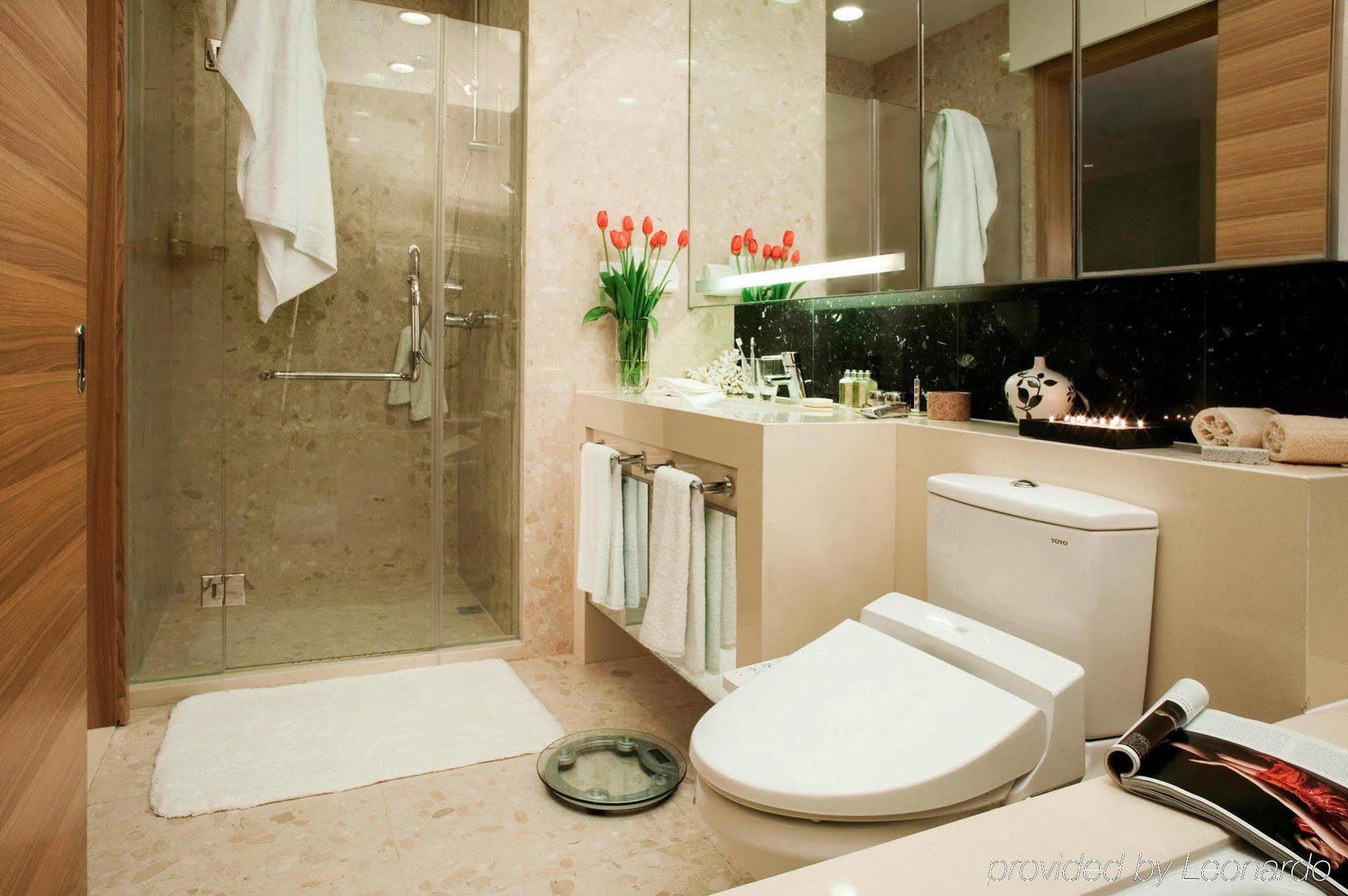 Somerset Grand Central Dalian Bagian luar foto