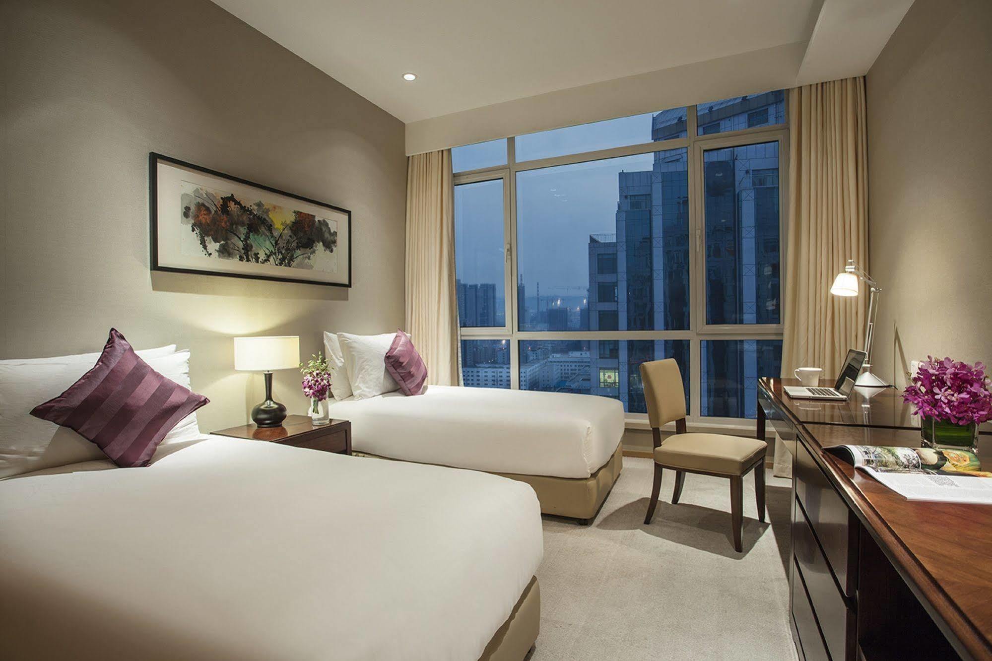 Somerset Grand Central Dalian Bagian luar foto