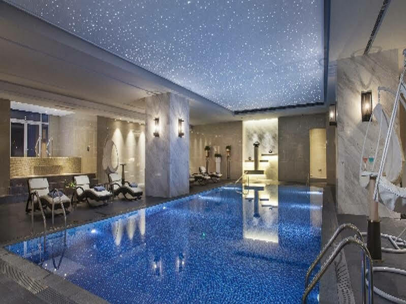 Somerset Grand Central Dalian Bagian luar foto